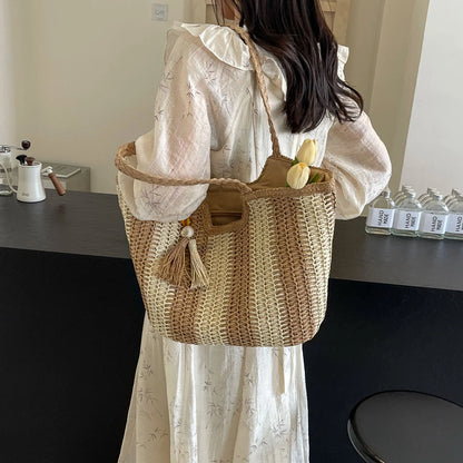 Elegant Striped Straw Tote Bag with Tassel Charm