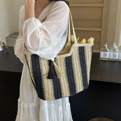 Elegant Striped Straw Tote Bag with Tassel Charm