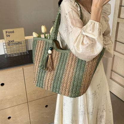 Elegant Striped Straw Tote Bag with Tassel Charm